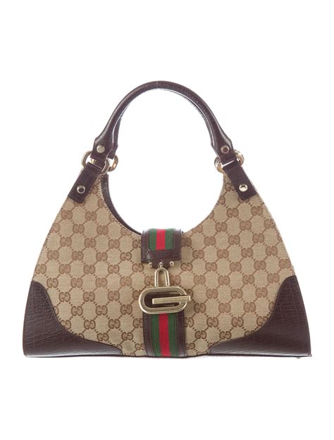 gucci hand clasp purse|Gucci purses for women sale.